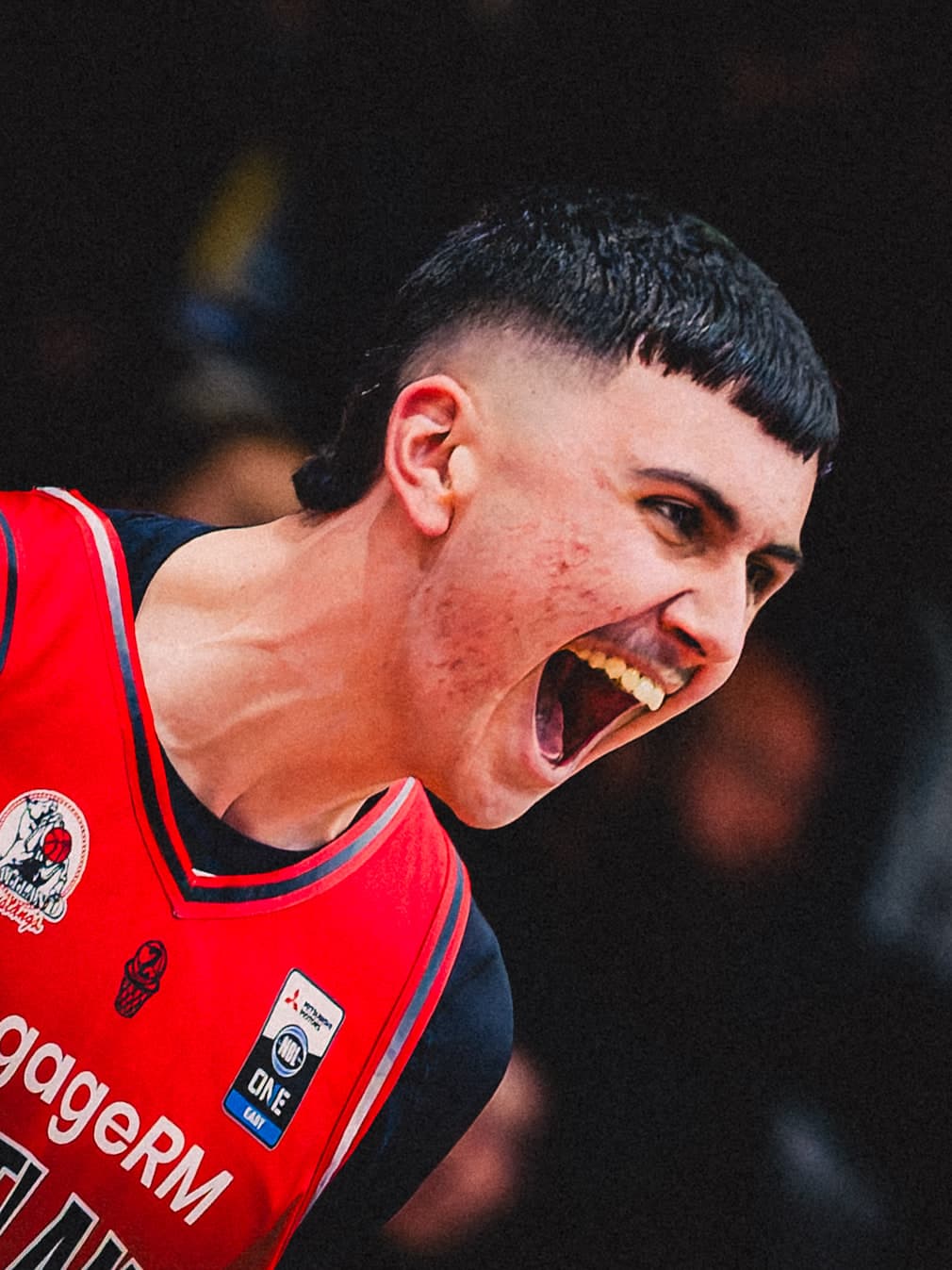 A Maitland Mustangs player roars with his head tipped back